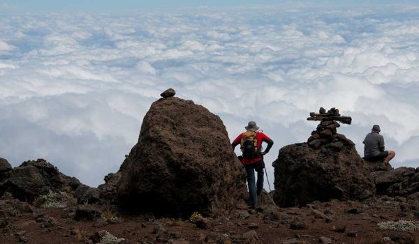 21682221 - on the trail to kilimanjaro looking out over the clouds
